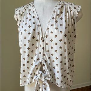 Free people sleeveless blouse with tie.  Size small